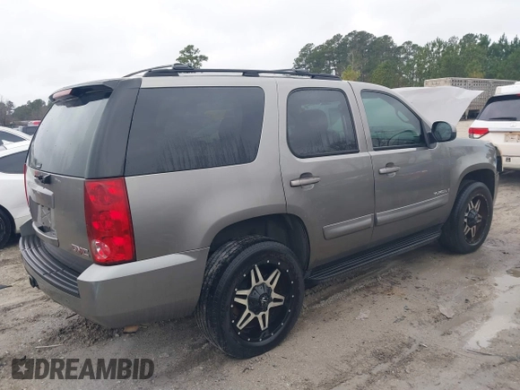 2007 GMC Yukon SLT with VIN 1GKFK13047R288220, listed as a IAAI auction lot 41579399 with 215,464 mi miles. Bid and sale history available at carsss.com. Image 4.
