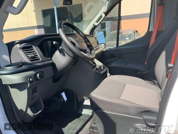 2023 Ford Transit Cargo with VIN 1FTBR1X83PKC02653, listed as a IAAI auction lot 42789310 with 242 mi miles and . Bid and sale history available at DreamBid. Image 1.
