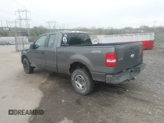 2007 Ford F-150 STX with VIN 1FTRX14W27NA19489, listed as a IAAI auction lot 42017455 with 222,297 mi miles. Bid and sale history available at carsss.com. Image 3.