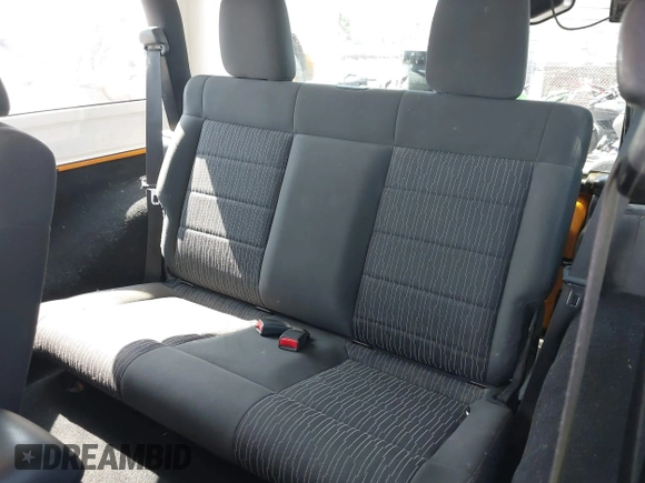 2012 Jeep Wrangler Sport with VIN 1C4AJWAG1CL286332, listed as a IAAI auction lot 42408102 with 169,204 mi miles and . Bid and sale history available at DreamBid. Image 8.