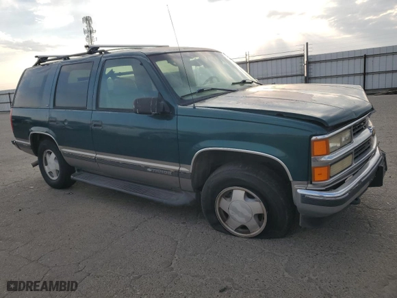 1998 Chevrolet Tahoe with VIN 1GNEK13R4WJ322201, listed as a Copart auction lot 64249464 with 241,168 mi miles and Salvage Title. Bid and sale history available at carsss.com. Image 4.