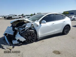 2022 Tesla Model Y Performance with VIN 7SAYGDEF9NF392197, listed as a Copart auction lot 57259105 with 43,400 mi miles and Salvage title. Bid and sale history available at DreamBid. Image 1.
