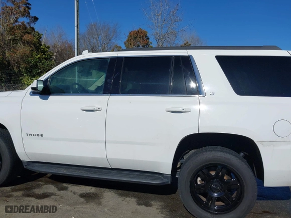 2019 Chevrolet Tahoe LT with VIN 1GNSKBKC7KR307869, listed as a IAAI auction lot 41833834 with 127,949 mi miles. Bid and sale history available at carsss.com. Image 14.