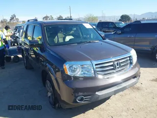 2015 Honda Pilot Touring with VIN 5FNYF3H94FB002236, listed as a IAAI auction lot 41735221 with 112,766 mi miles. Bid and sale history available at carsss.com. Image 1.