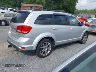 2014 Dodge Journey R/T with VIN 3C4PDDEG7ET139410, listed as a IAAI auction lot 42808542 with 185,712 mi miles and . Bid and sale history available at DreamBid. Image 4.