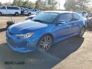 2014 Scion tC with VIN JTKJF5C73E3088162, listed as a Copart auction lot 82244494 with 93,227 mi miles and Salvage Title. Bid and sale history available at carsss.com. Image 1.