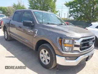 2023 Ford F-150 XL with VIN 1FTEW1C88PFC20988, listed as a IAAI auction lot 41878934 with 41,670 mi miles. Bid and sale history available at carsss.com. Image 1.