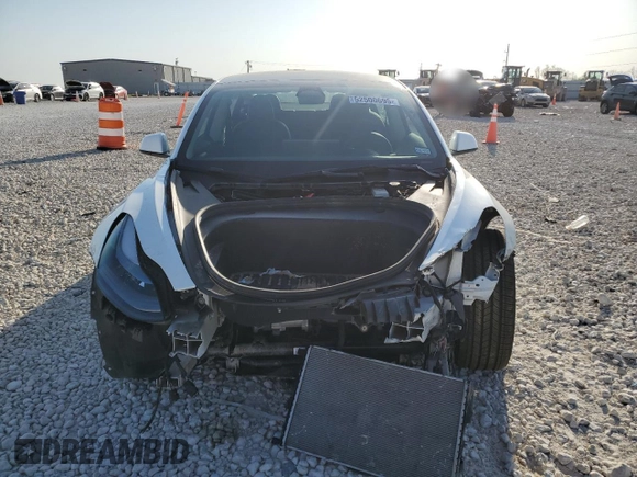 2023 Tesla Model 3 with VIN 5YJ3E1EA4PF631304, listed as a Copart auction lot 52500695 with 33,024 mi miles and Salvage title. Bid and sale history available at DreamBid. Image 5.