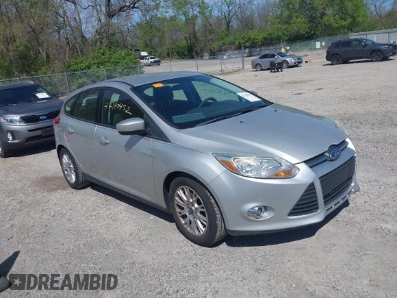 2012 Ford Focus SE with VIN 1FAHP3K27CL333433, listed as a IAAI auction lot 42140452 with 156,048 mi miles and . Bid and sale history available at carsss.com. Image 1.