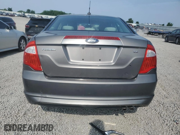 2010 Ford Fusion SE z VIN 3FAHP0HA2AR364858, wystawiony jako Copart lot #60855075 z przebiegiem 184 403 mil mil oraz Szkoda całkowita • Salvage title. Historia ofert i sprzedaży dostępna na DreamBid. Obrazek 6.