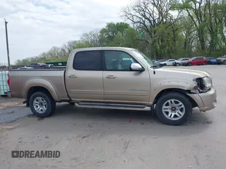 2004 Toyota Tundra SR5 with VIN 5TBET34154S453236, listed as a IAAI auction lot 42034322 with 209,028 mi miles and . Bid and sale history available at carsss.com. Image 13.