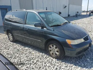 2004 Honda Odyssey EX-RES z VIN 5FNRL188X4B151031, wystawiony jako Copart lot #55144675 z przebiegiem 227 486 mil mil oraz Szkoda całkowita • Salvage title. Historia ofert i sprzedaży dostępna na DreamBid. Obrazek 4.
