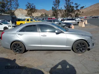 2013 Cadillac ATS z VIN 1G6AA5RA2D0120840, wystawiony jako IAAI lot #41276871 z przebiegiem 179 999 mil mil oraz . Historia ofert i sprzedaży dostępna na DreamBid. Obrazek 13.