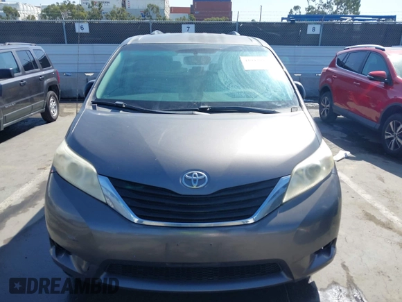 2012 Toyota Sienna LE AAS with VIN 5TDKK3DC9CS184722, listed as a IAAI auction lot 41942991 with 227,783 mi miles. Bid and sale history available at carsss.com. Image 12.