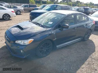 2019 Subaru WRX Premium with VIN JF1VA1F64K8809712, listed as a IAAI auction lot 41274034 with 82,689 mi miles. Bid and sale history available at carsss.com. Image 2.