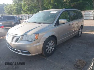 2014 Chrysler Town & Country Touring with VIN 2C4RC1BG7ER277126, listed as a IAAI auction lot 42072934 with 81,307 mi miles and . Bid and sale history available at DreamBid. Image 2.