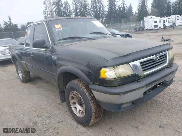 1999 Mazda B-Series 4WD Truck SE with VIN 4F4ZR17X5XTM17667, listed as a IAAI auction lot 41896804 with NaN miles. Bid and sale history available at carsss.com. Image 1.