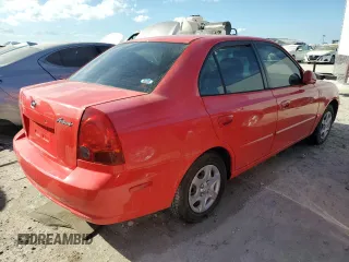 2005 Hyundai Accent GLS with VIN KMHCG45C15U596671, listed as a Copart auction lot 74834004 with 0 mi miles and Salvage Title. Bid and sale history available at carsss.com. Image 3.