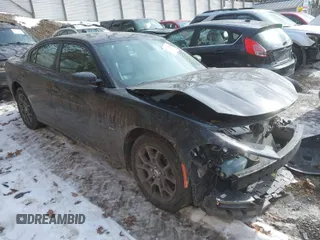 2018 Dodge Charger GT with VIN 2C3CDXJG2JH307760, listed as a IAAI auction lot 41416308 with 76,490 mi miles. Bid and sale history available at carsss.com. Image 1.