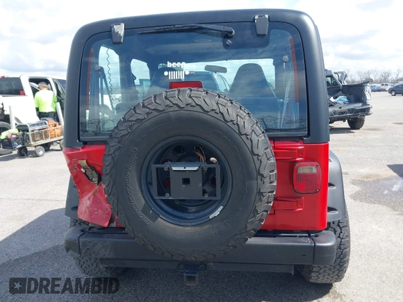 2002 Jeep Wrangler X with VIN 1J4FA39S02P739211, listed as a IAAI auction lot 41665910 with 144,118 mi miles. Bid and sale history available at carsss.com. Image 16.