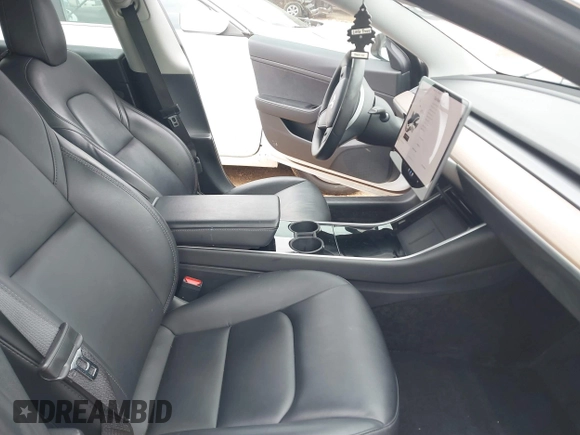 2020 Tesla Model 3 Standard Range Plus with VIN 5YJ3E1EA1LF738062, listed as a IAAI auction lot 41747581 with 41,897 mi miles. Bid and sale history available at carsss.com. Image 5.