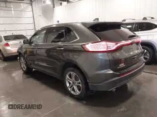 2017 Ford Edge Titanium z VIN 2FMPK4K95HBB57606, wystawiony jako IAAI lot #42139449 z przebiegiem 117 228 mil mil oraz . Historia ofert i sprzedaży dostępna na DreamBid. Obrazek 3.