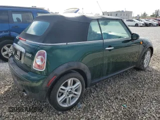 2015 MINI Convertible z VIN WMWZN3C5XFT861708, wystawiony jako Copart lot #82233054 z przebiegiem 38 498 mil mil oraz Czysty tytuł • Clean title. Historia ofert i sprzedaży dostępna na DreamBid. Obrazek 3.