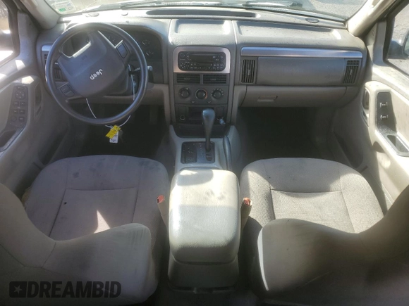 2003 Jeep Grand Cherokee Laredo with VIN 1J4GX48S73C520104, listed as a Copart auction lot 50227245 with 262,348 mi miles and Salvage Title. Bid and sale history available at carsss.com. Image 8.
