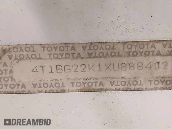 1999 Toyota Camry LE z VIN 4T1BG22K1XU888402, wystawiony jako IAAI lot #42483791 z przebiegiem 149 512 mil mil oraz . Historia ofert i sprzedaży dostępna na DreamBid. Obrazek 17.