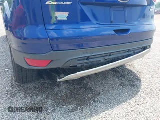2013 Ford Escape SE z VIN 1FMCU9GX2DUD00321, wystawiony jako IAAI lot #42494558 z przebiegiem 117 600 mil mil oraz . Historia ofert i sprzedaży dostępna na DreamBid. Obrazek 6.