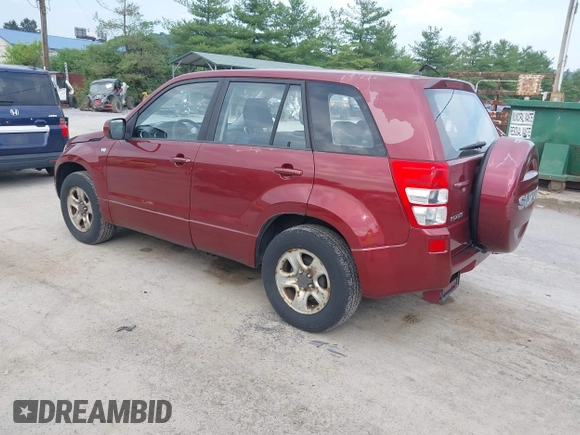 2008 Suzuki Grand Vitara w/Spare & Cargo Covers z VIN JS3TD941784101146, wystawiony jako IAAI lot #42546416 z przebiegiem 83 064 mil mil oraz . Historia ofert i sprzedaży dostępna na DreamBid. Obrazek 3.