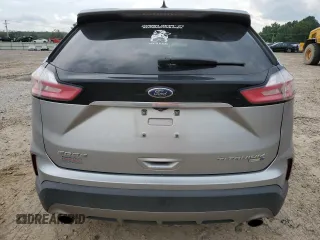 2020 Ford Edge Titanium с VIN 2FMPK4K94LBB35427, выставлен на аукционе Copart как лот 59682805 с пробегом 102 994 миль миль и Списание • Salvage title. История ставок и продаж доступна на DreamBid. Изображение 6.