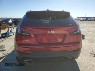 2021 Cadillac XT4 FWD Sport with VIN 1GYFZER44MF015178, listed as a Copart auction lot 84687224 with 46,190 mi miles and Salvage Title. Bid and sale history available at DreamBid. Image 6.