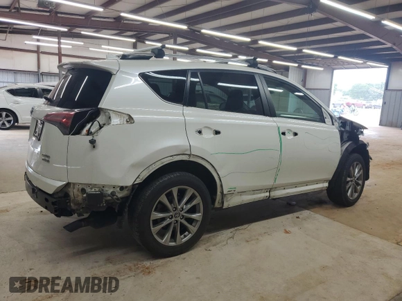 2016 Toyota RAV4 Limited with VIN JTMDJREV9GD014991, listed as a Copart auction lot 61238115 with Not provided miles and Salvage title. Bid and sale history available at DreamBid. Image 3.