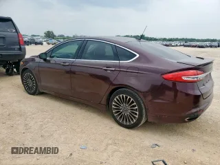 2017 Ford Fusion Titanium with VIN 3FA6P0K90HR178834, listed as a Copart auction lot 57420795 with 127,977 mi miles and Salvage title. Bid and sale history available at DreamBid. Image 2.