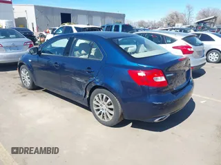2010 Suzuki Kizashi SE with VIN JS2RE9A31A6100988, listed as a IAAI auction lot 41826305 with 173,168 mi miles and . Bid and sale history available at DreamBid. Image 3.