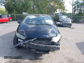 2010 Honda Insight EX with VIN JHMZE2H76AS000837, listed as a IAAI auction lot 42103333 with 146,576 mi miles and . Bid and sale history available at DreamBid. Image 12.