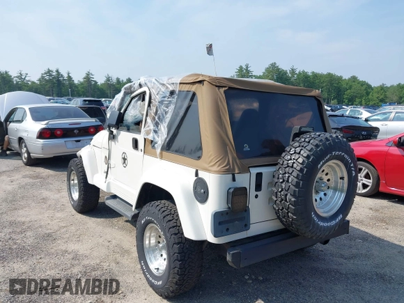 2002 Jeep Wrangler Sahara with VIN 1J4FA59S92P734763, listed as a IAAI auction lot 42411004 with 188,213 mi miles and . Bid and sale history available at DreamBid. Image 3.