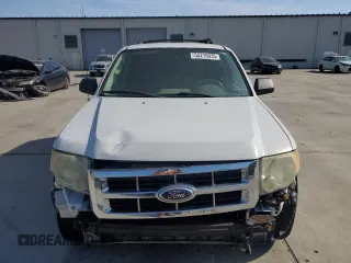 2009 Ford Escape XLS with VIN 1FMCU02719KB53740, listed as a Copart auction lot 55210035 with 144,672 mi miles and Salvage title. Bid and sale history available at DreamBid. Image 5.