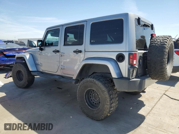 2013 Jeep Wrangler Unlimited Sahara with VIN 1C4BJWEG5DL662756, listed as a Copart auction lot 56423615 with 189,355 mi miles and Salvage title. Bid and sale history available at DreamBid. Image 2.