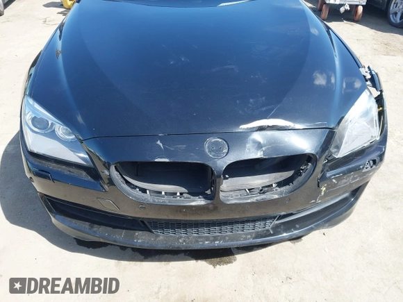 2013 BMW 6 Series 650i with VIN WBAYM9C57DDW20178, listed as a IAAI auction lot 41933561 with 72,886 mi miles and . Bid and sale history available at carsss.com. Image 6.