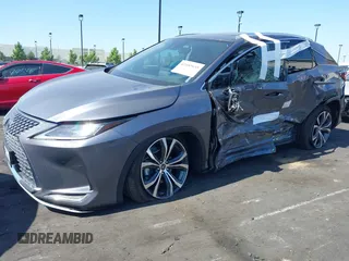 2022 Lexus RX 450h with VIN 2T2HGMDA4NC077617, listed as a IAAI auction lot 42489655 with 37,683 mi miles and . Bid and sale history available at DreamBid. Image 6.