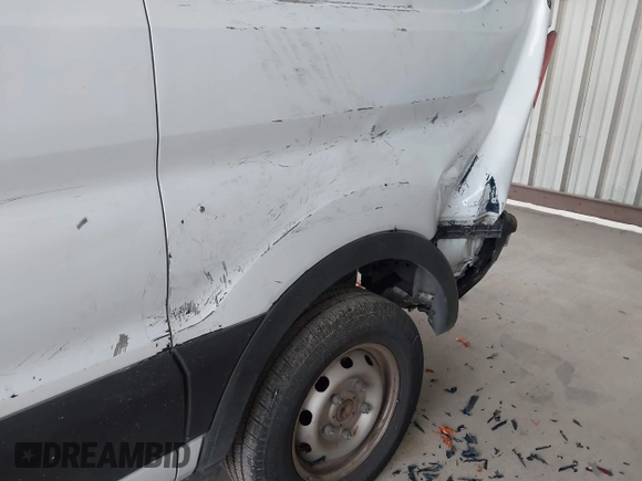 2019 Ford Transit with VIN 1FTYE1ZM2KKB46391, listed as a IAAI auction lot 41362328 with 128,327 mi miles and . Bid and sale history available at carsss.com. Image 21.