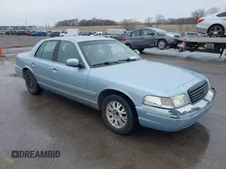 2003 Ford Crown Victoria LX z VIN 2FAHP74W83X156742, wystawiony jako IAAI lot #41912046 z przebiegiem 155 497 mil mil oraz . Historia ofert i sprzedaży dostępna na DreamBid. Obrazek 1.