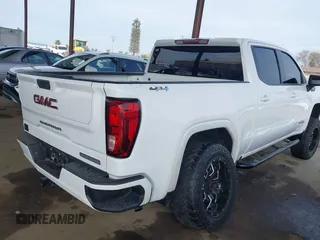2021 GMC Sierra 1500 Elevation with VIN 3GTU9CED5MG236469, listed as a IAAI auction lot 41691714 with 36,594 mi miles and . Bid and sale history available at DreamBid. Image 4.