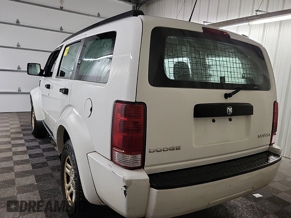 2011 Dodge Nitro SE z VIN 1D4PT2GK2BW589063, wystawiony jako IAAI lot #42408917 z przebiegiem 160 504 mil mil oraz . Historia ofert i sprzedaży dostępna na DreamBid. Obrazek 37.