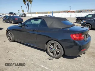 2015 BMW 2 Series M235i with VIN WBA1M1C56FV393730, listed as a Copart auction lot 45348734 with 59,231 mi miles and Salvage title. Bid and sale history available at DreamBid. Image 2.