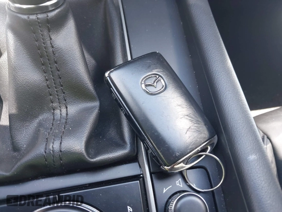 2022 Mazda 3 Select z VIN JM1BPAKL1N1519383, wystawiony jako IAAI lot #39742243 z przebiegiem 20 080 mil mil oraz . Historia ofert i sprzedaży dostępna na DreamBid. Obrazek 11.