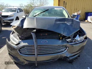 2016 Ford Fusion SE Hybrid with VIN 3FA6P0LU3GR307666, listed as a Copart auction lot 57444365 with 127,786 mi miles and Salvage title. Bid and sale history available at DreamBid. Image 5.