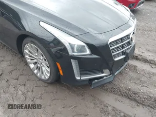 2014 Cadillac CTS Luxury AWD with VIN 1G6AX5SX9E0195923, listed as a IAAI auction lot 40946334 with Not Provided miles and . Bid and sale history available at carsss.com. Image 6.